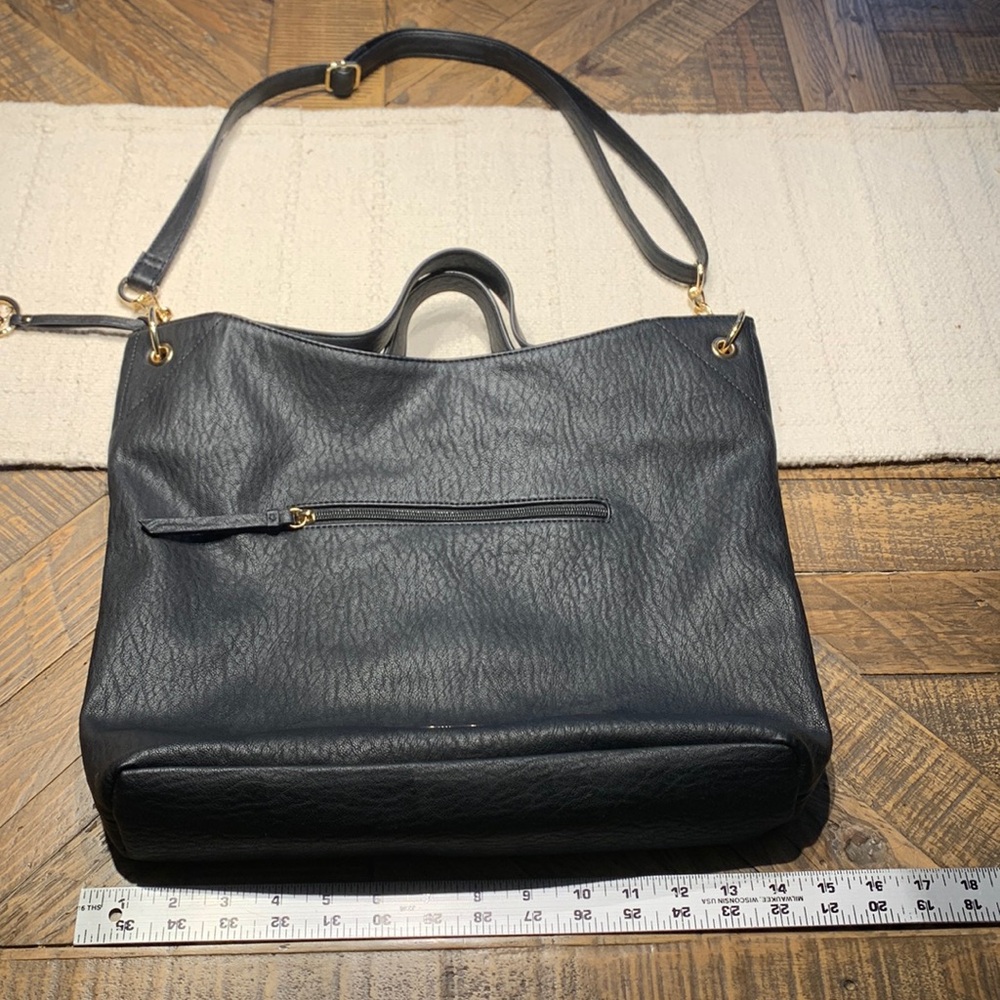 Jessica Simpson bag. 13in x14 in black polyurethane purse